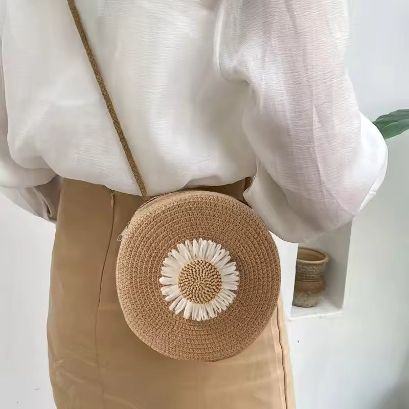 FloralCircle: Vintage straw crossbody with floral decor. By Agency286.